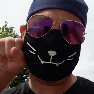 Brand new 3 kitten face dust masks. Reusable.